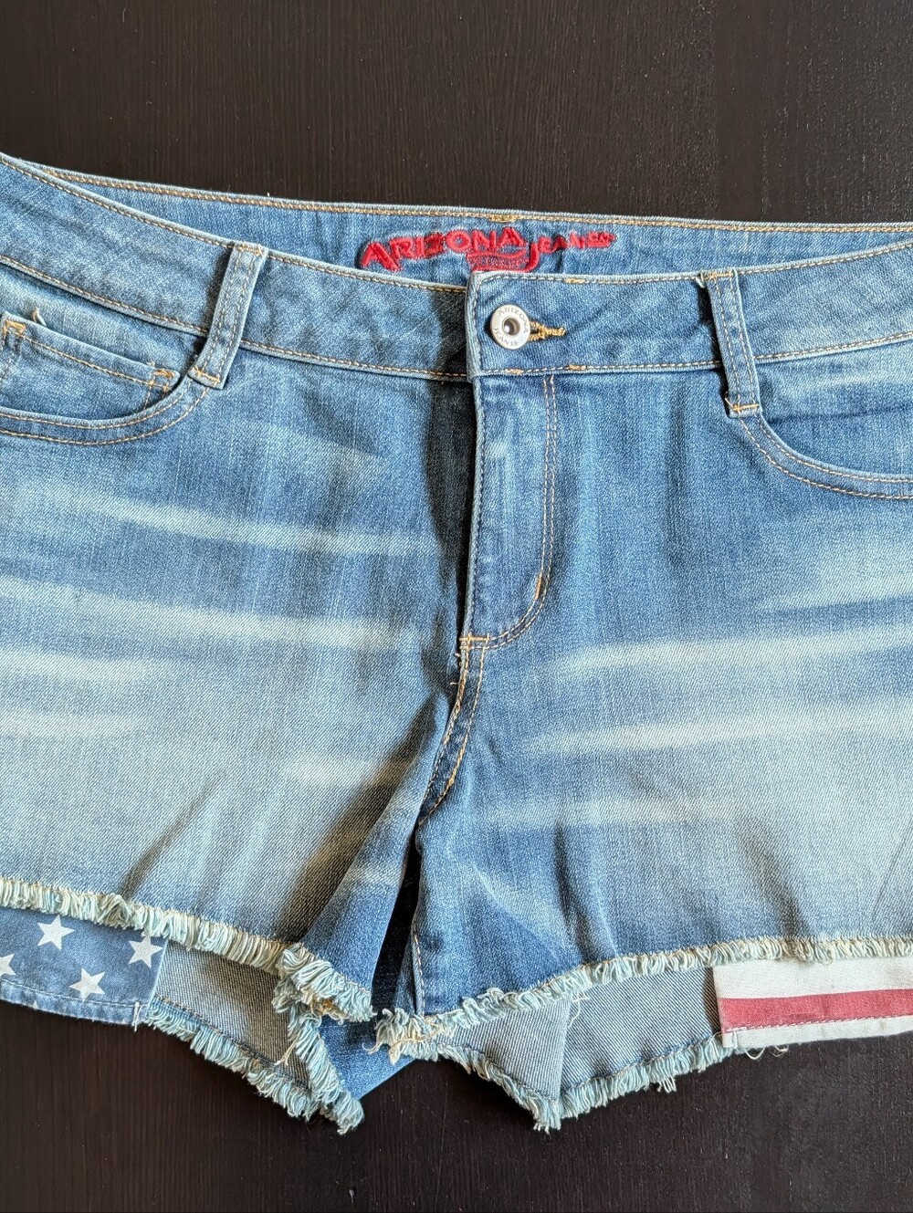 Arizona Jean Company Light Blue Distressed Denim Shorts with Flag Trim